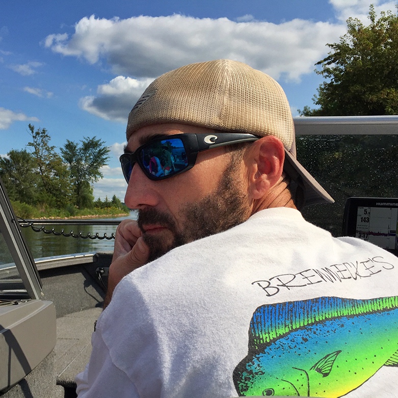 Mike driving his boat on Lake Minnetonka