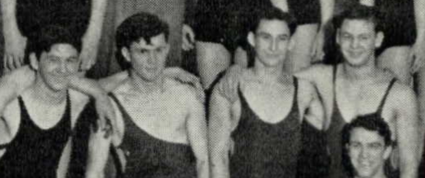 Donald (left) and Bob (right, standing) Livengood on the swim team
